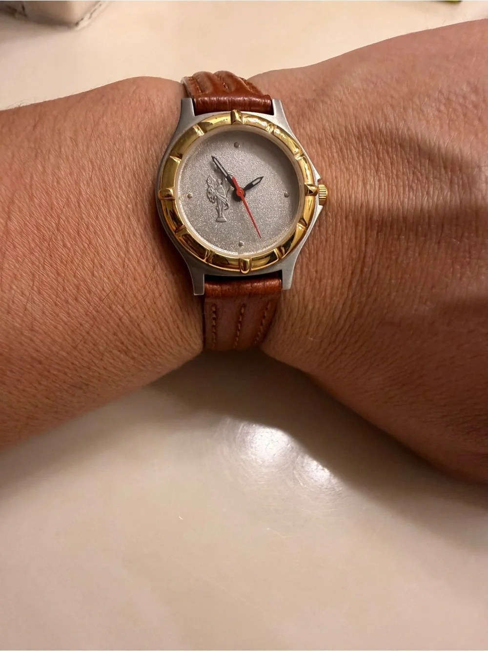 Brown Leather-Strap Watch with Gold-Bezel Accent need battery